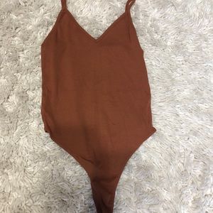 Tan/brown body suit